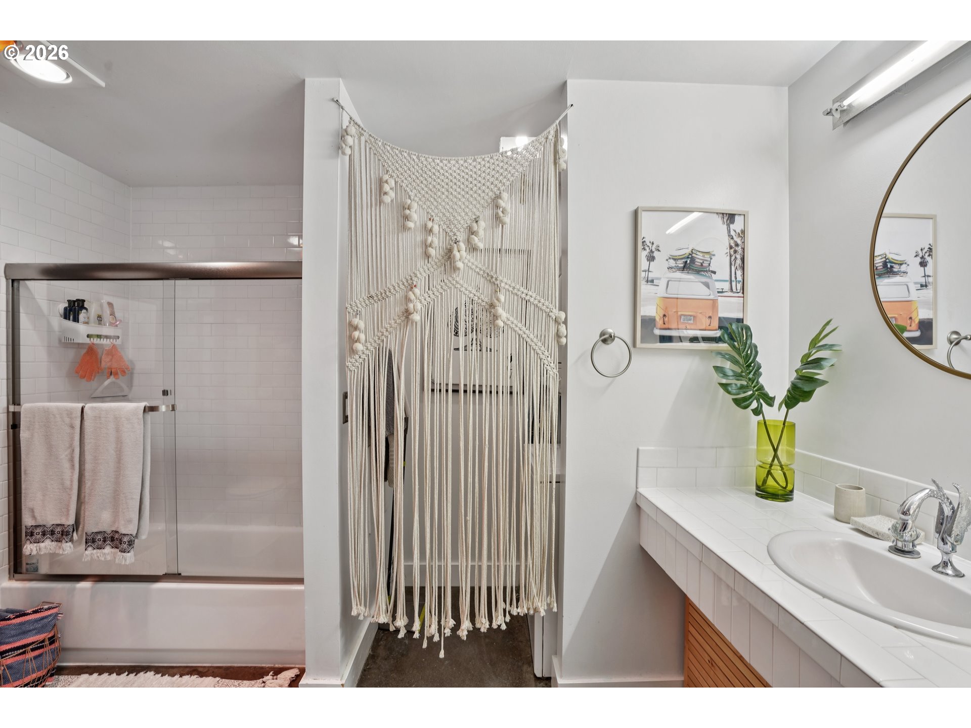 411 Northwest Flanders Street, Unit 302 Portland, OR 97209 - Photo 26 of 41 a bathroom with a sink and a mirror