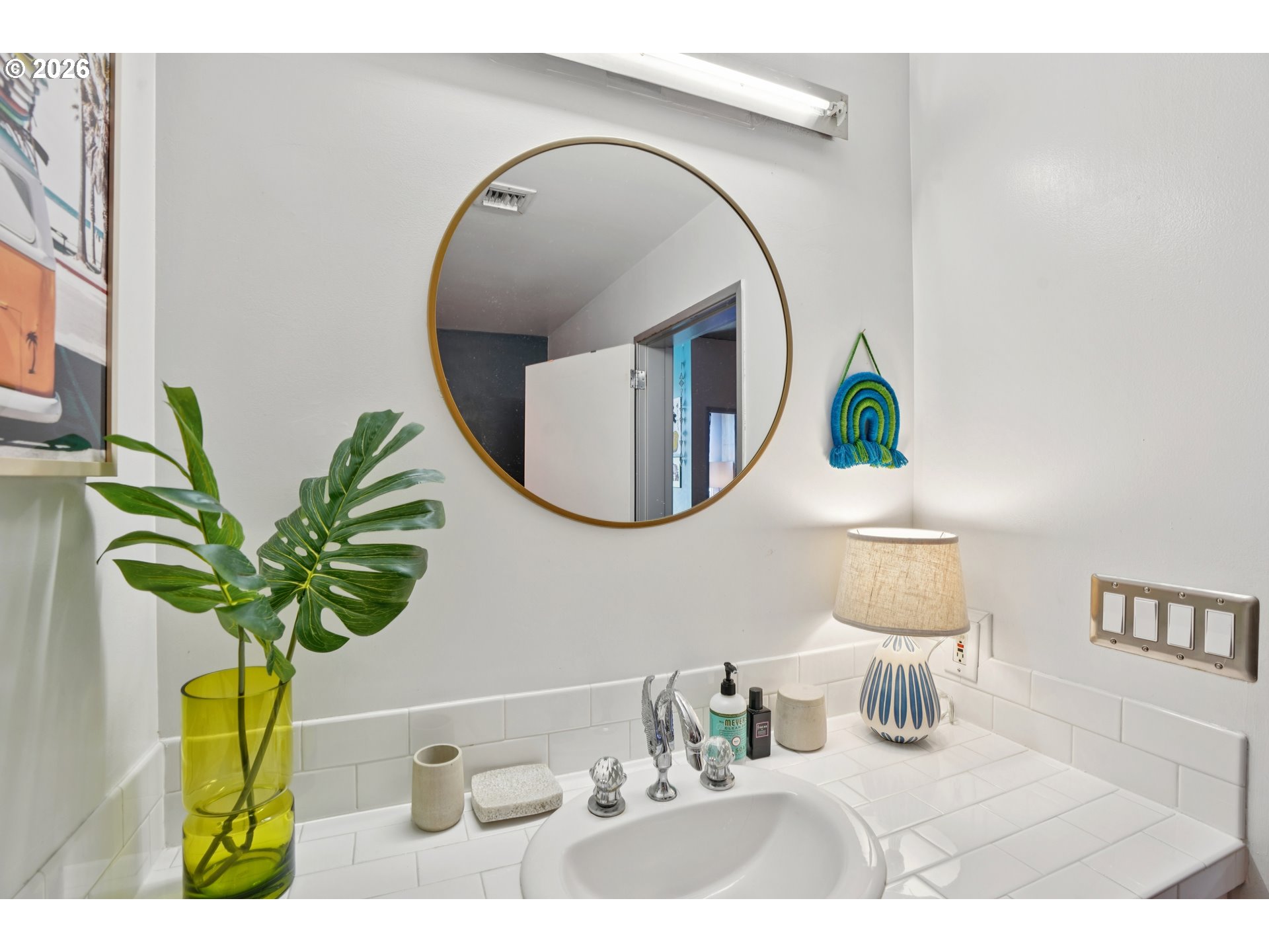 411 Northwest Flanders Street, Unit 302 Portland, OR 97209 - Photo 27 of 41 a vase of flowers sitting on a table with potted plants