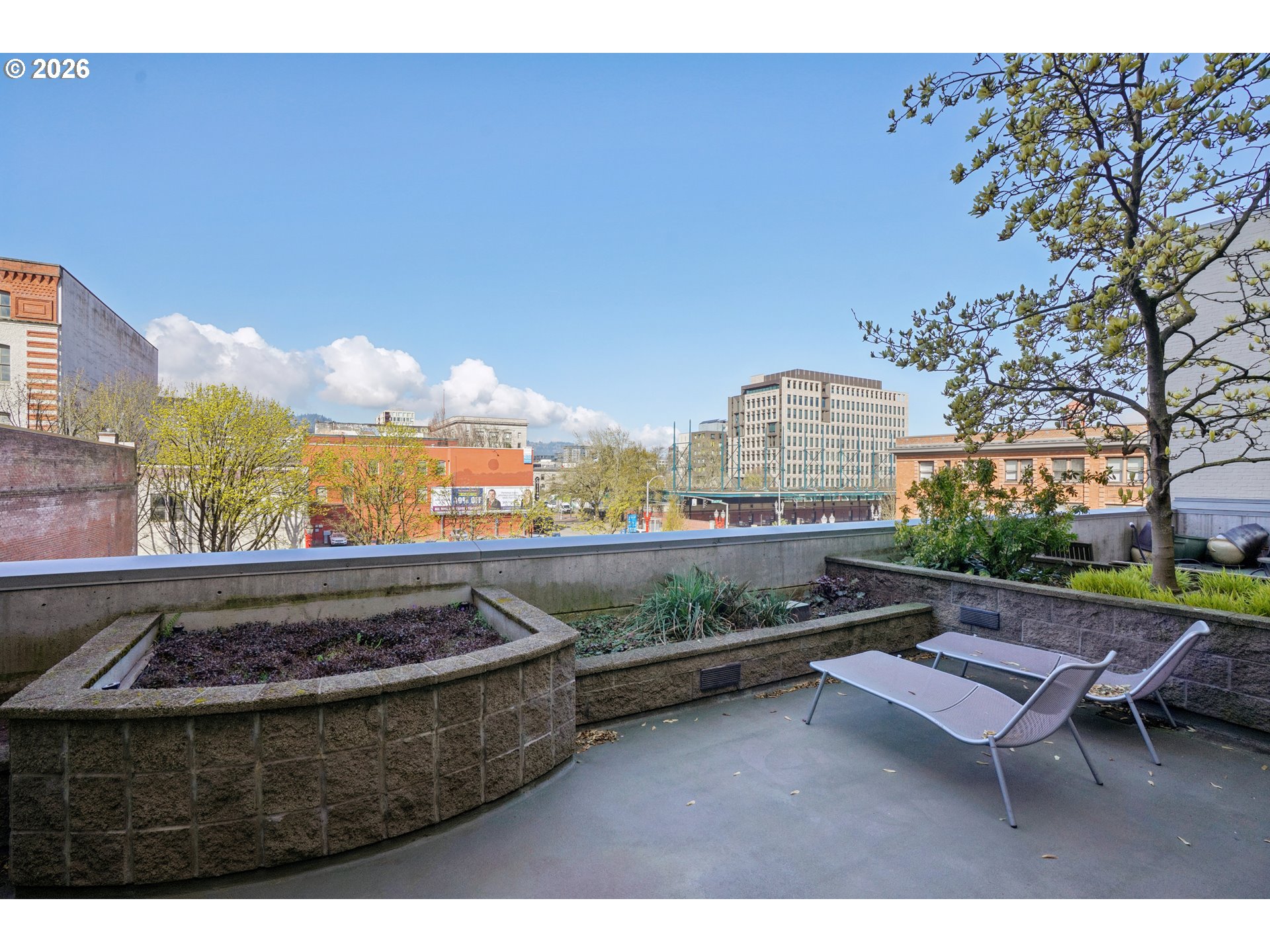 411 Northwest Flanders Street, Unit 302 Portland, OR 97209 - Photo 34 of 41 a view of a chairs and table in the terrace