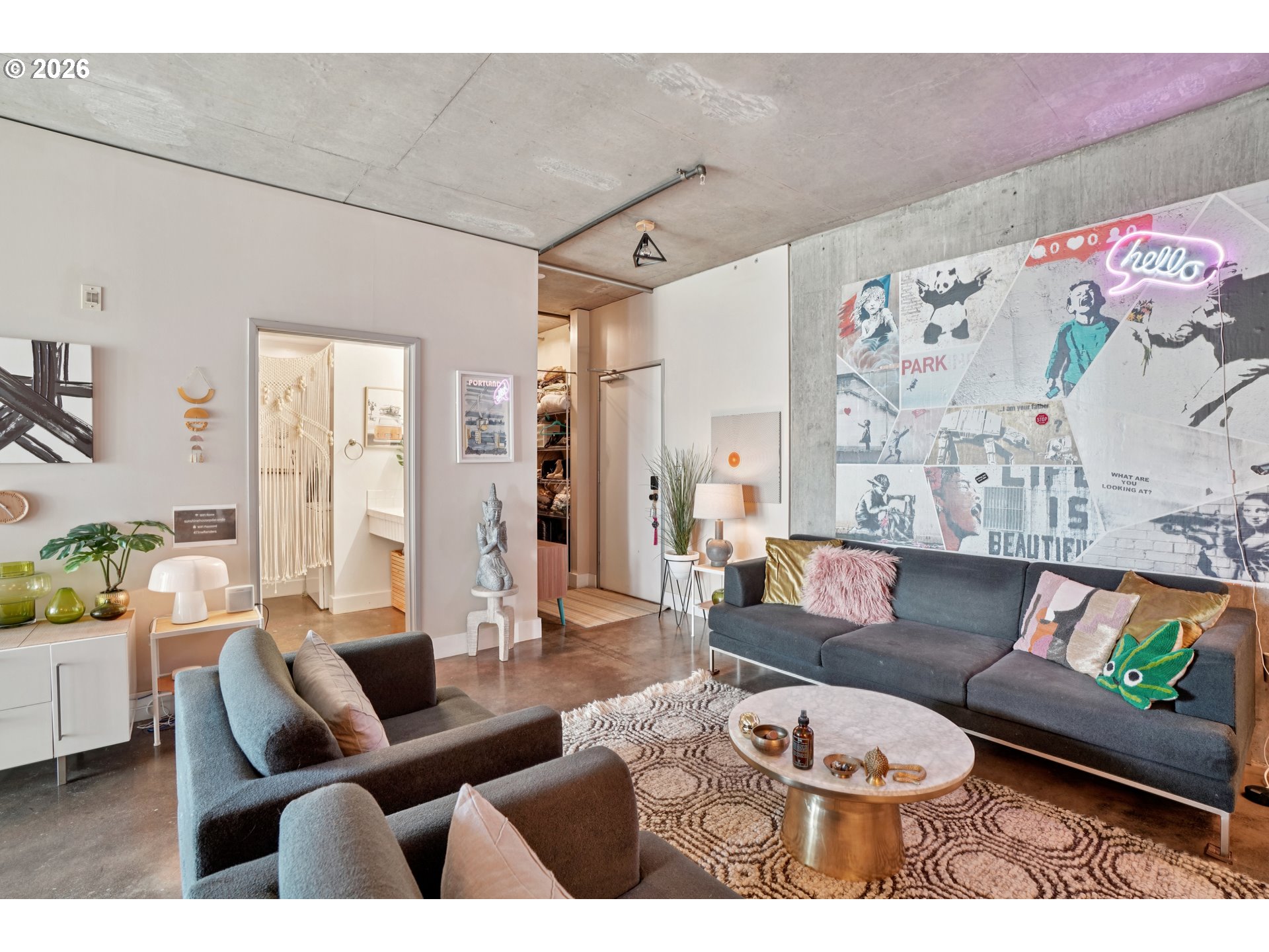 411 Northwest Flanders Street, Unit 302 Portland, OR 97209 - Photo 9 of 41 a living room with furniture and wooden floor