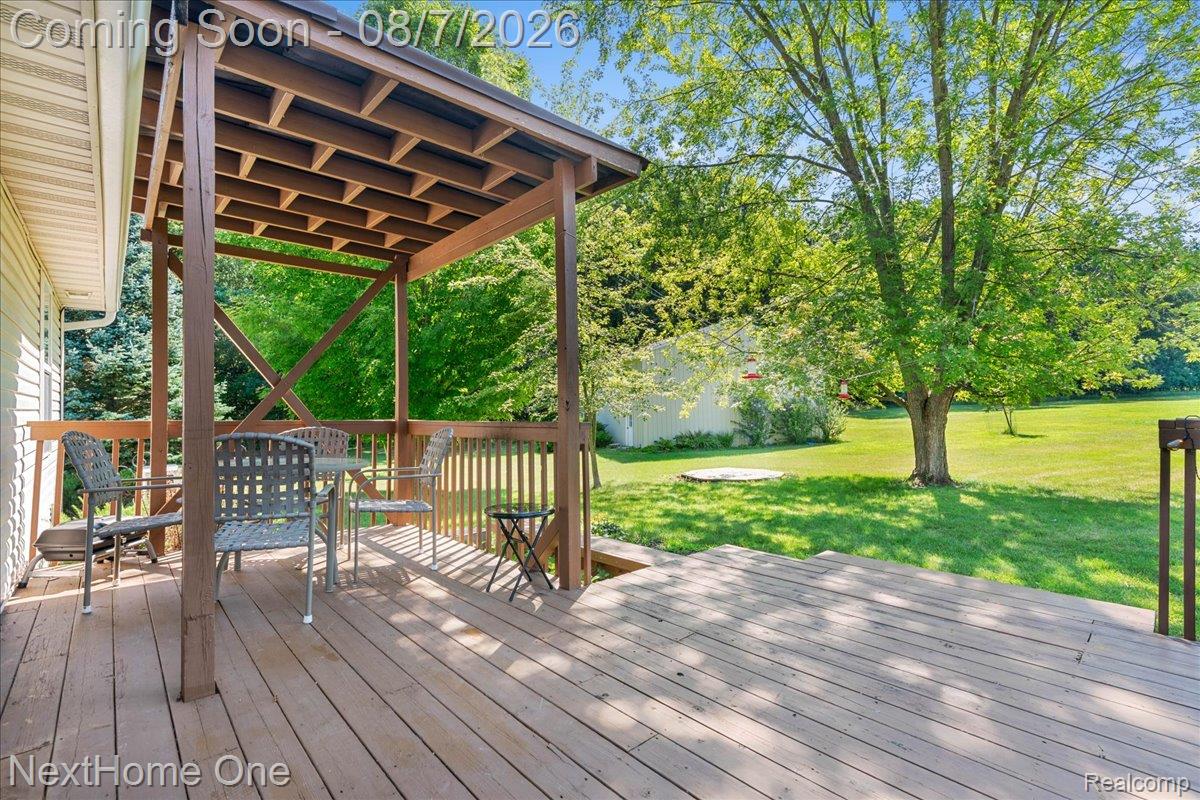 6260 Faussett Road Howell, MI 48855 - Photo 34 of 44 Rear deck cozy sitting area