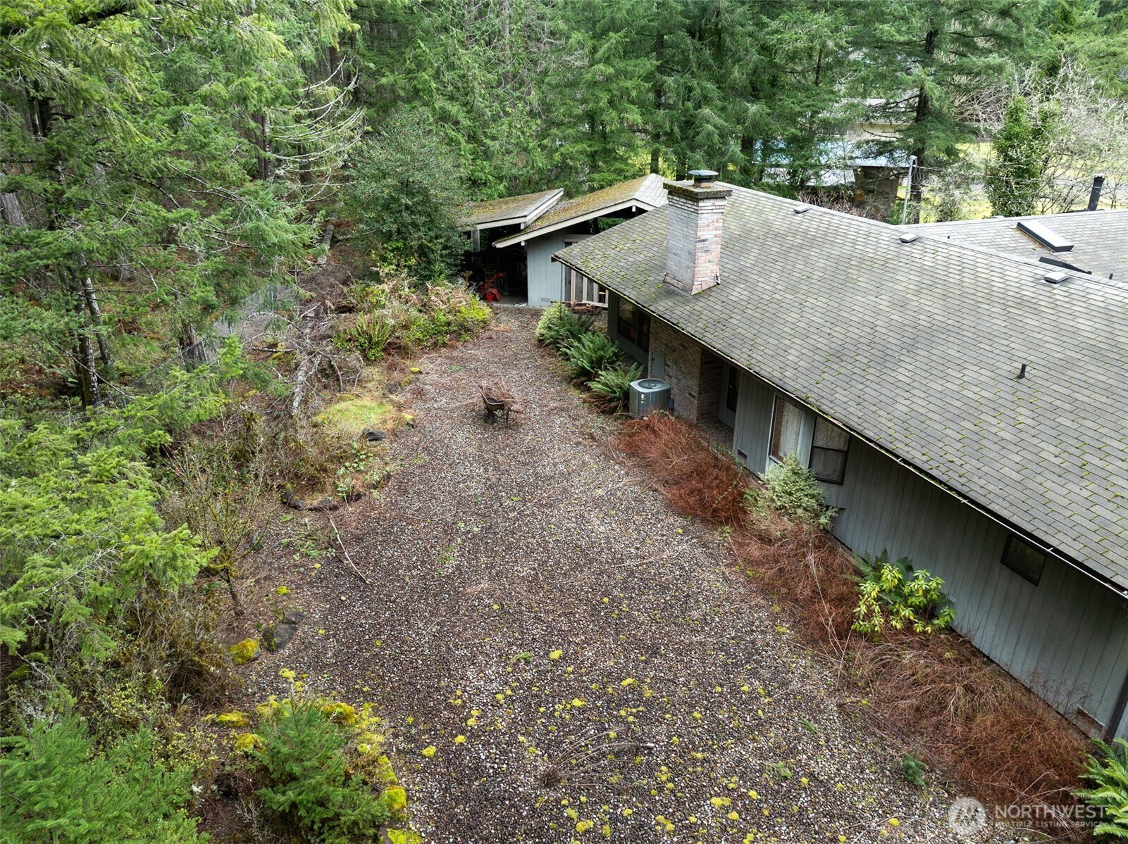 29722 Southeast Kent Kangley Road Ravensdale, WA 98051 - Photo 15 of 28 a view of a house with a patio
