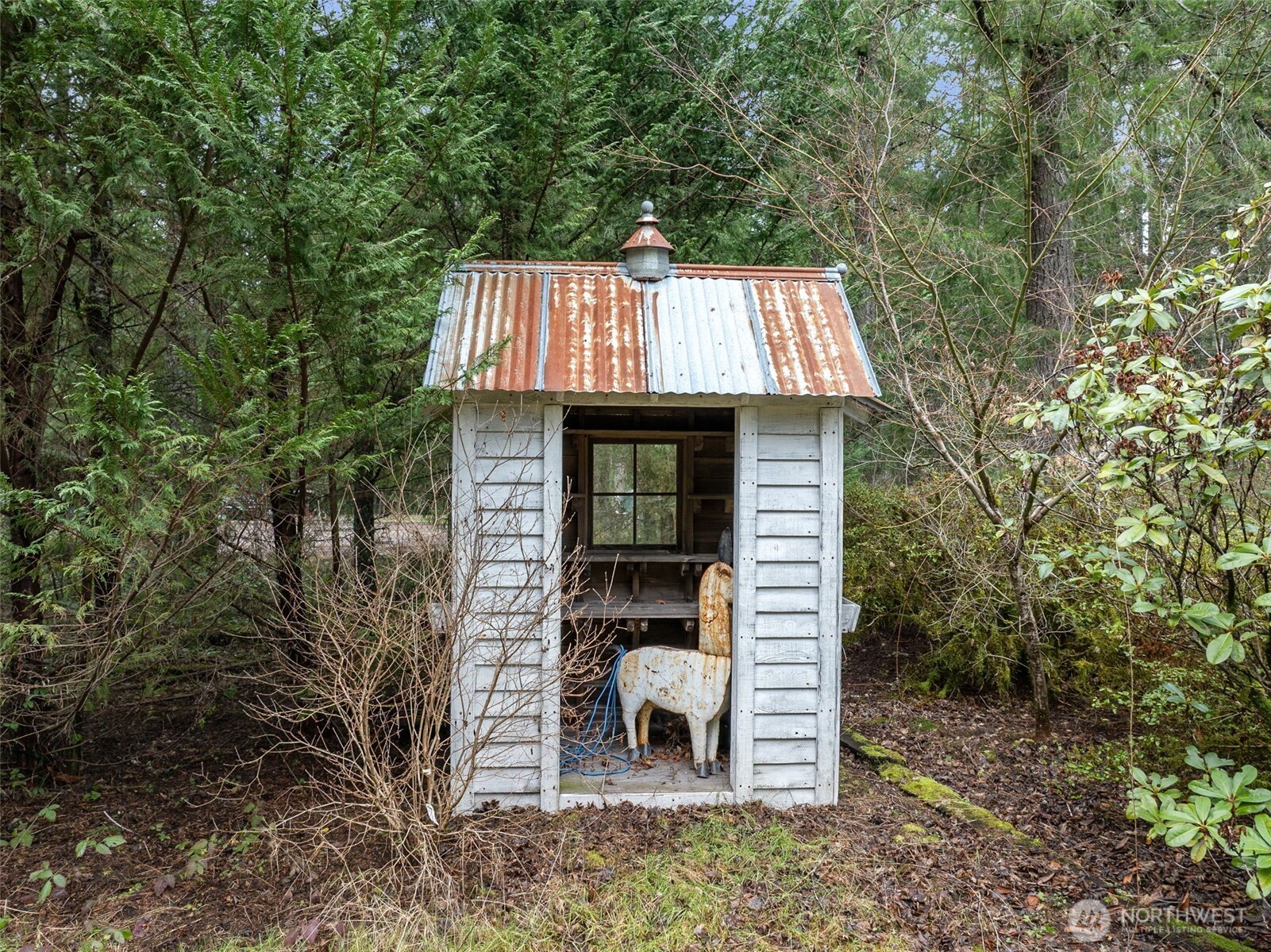 29722 Southeast Kent Kangley Road Ravensdale, WA 98051 - Photo 24 of 28 a front view of a house with garden