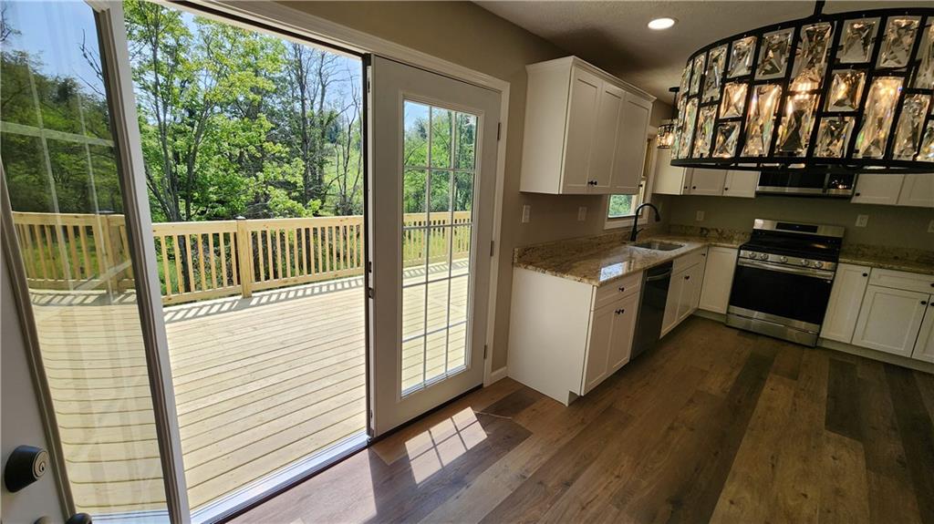1064 Renton Road Pittsburgh, PA 15239 - Photo 14 of 40 French doors from dining room to deck