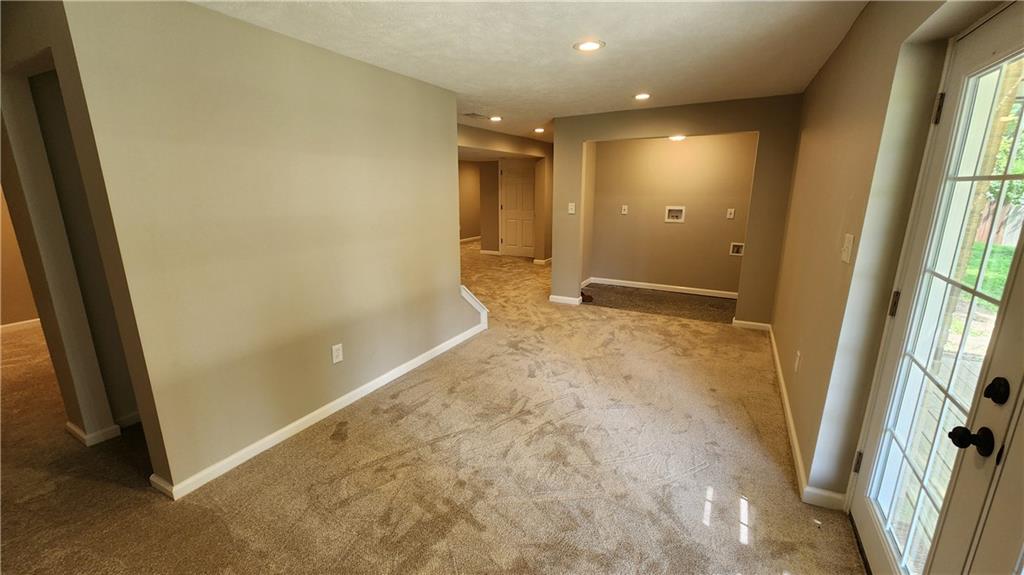1064 Renton Road Pittsburgh, PA 15239 - Photo 38 of 40 additional open room looking to laundry area