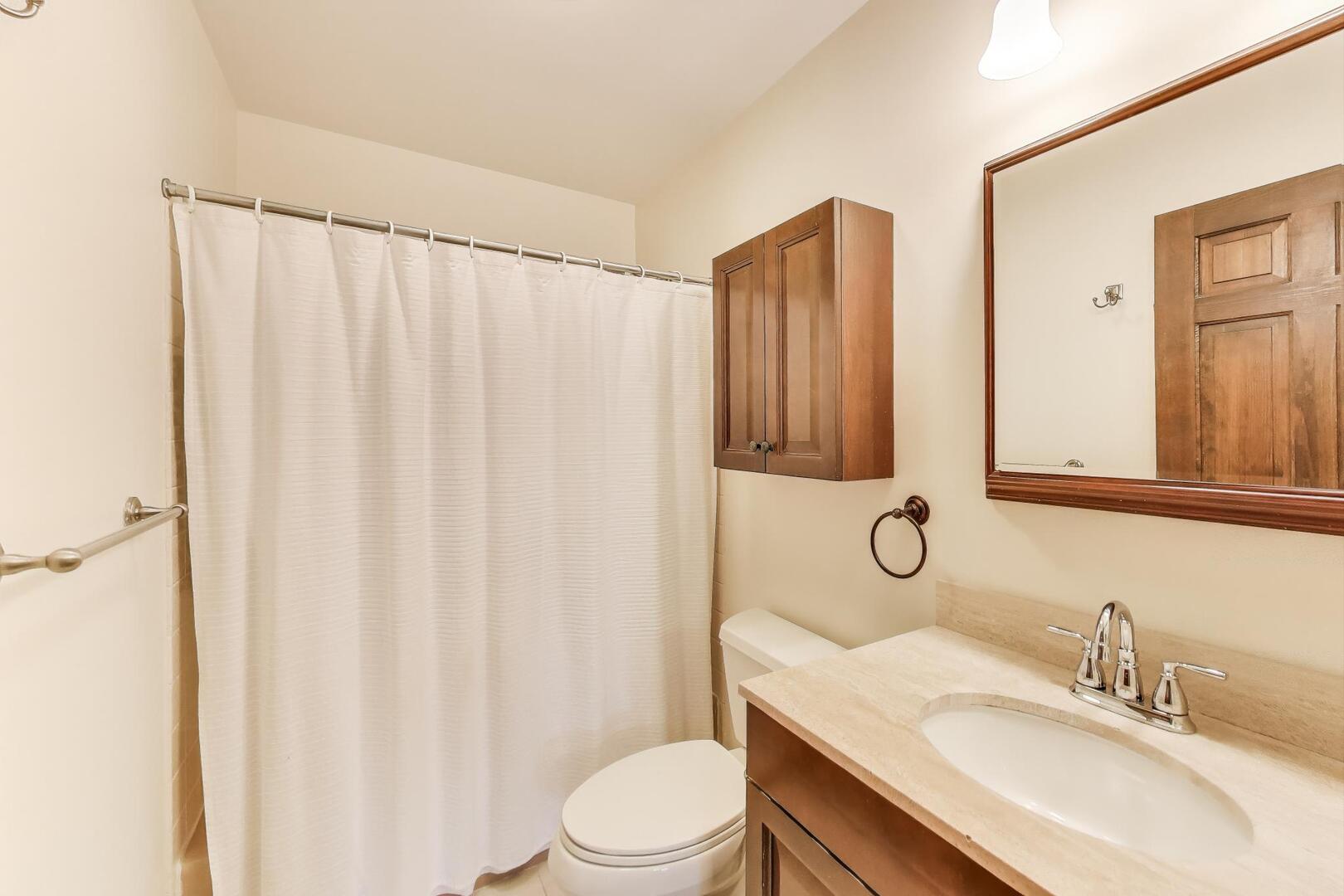 829 Shiloh Circle Naperville, IL 60540 - Photo 19 of 40 a bathroom with a sink toilet and shower