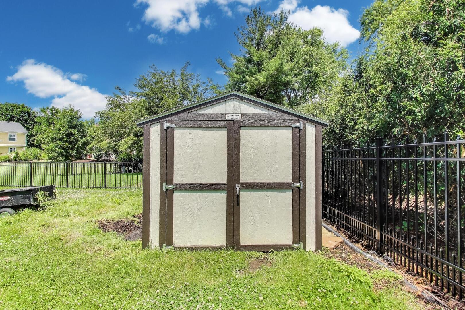829 Shiloh Circle Naperville, IL 60540 - Photo 36 of 40 a view of backyard with a barn and a cactus plant