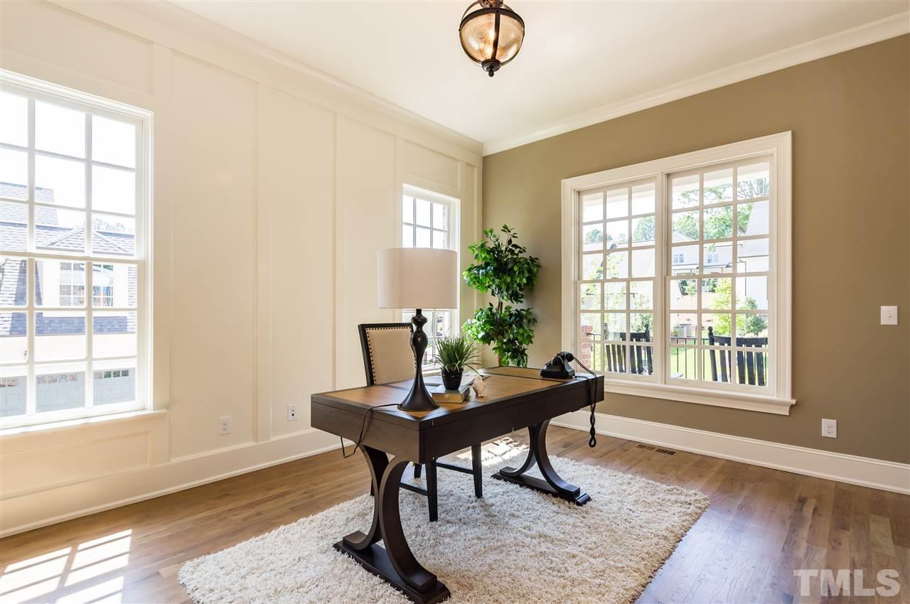 5208 Woodall Way, Unit 11 Raleigh, NC 27613 - Photo 11 of 25 a workspace with furniture window and wooden floor