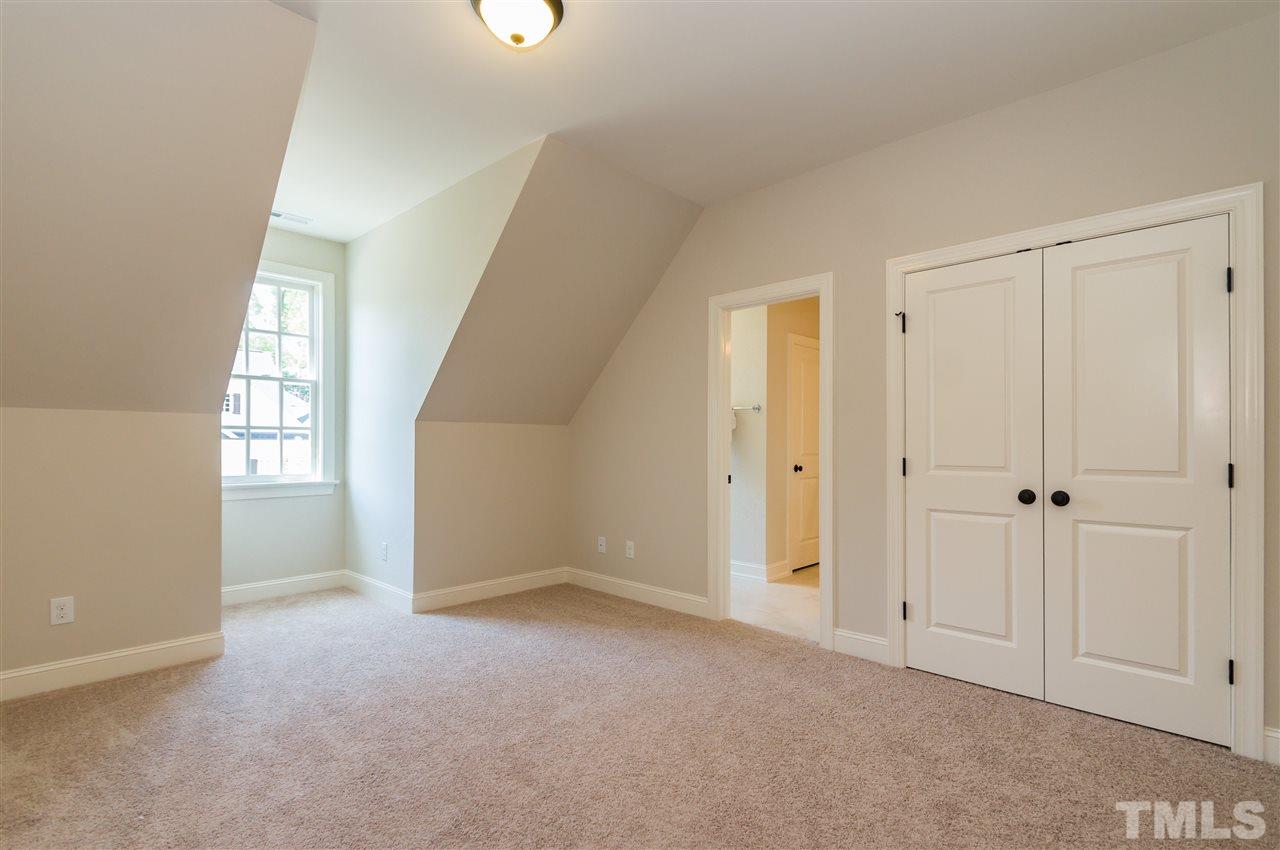 5208 Woodall Way, Unit 11 Raleigh, NC 27613 - Photo 17 of 25 a view of an empty room with a window