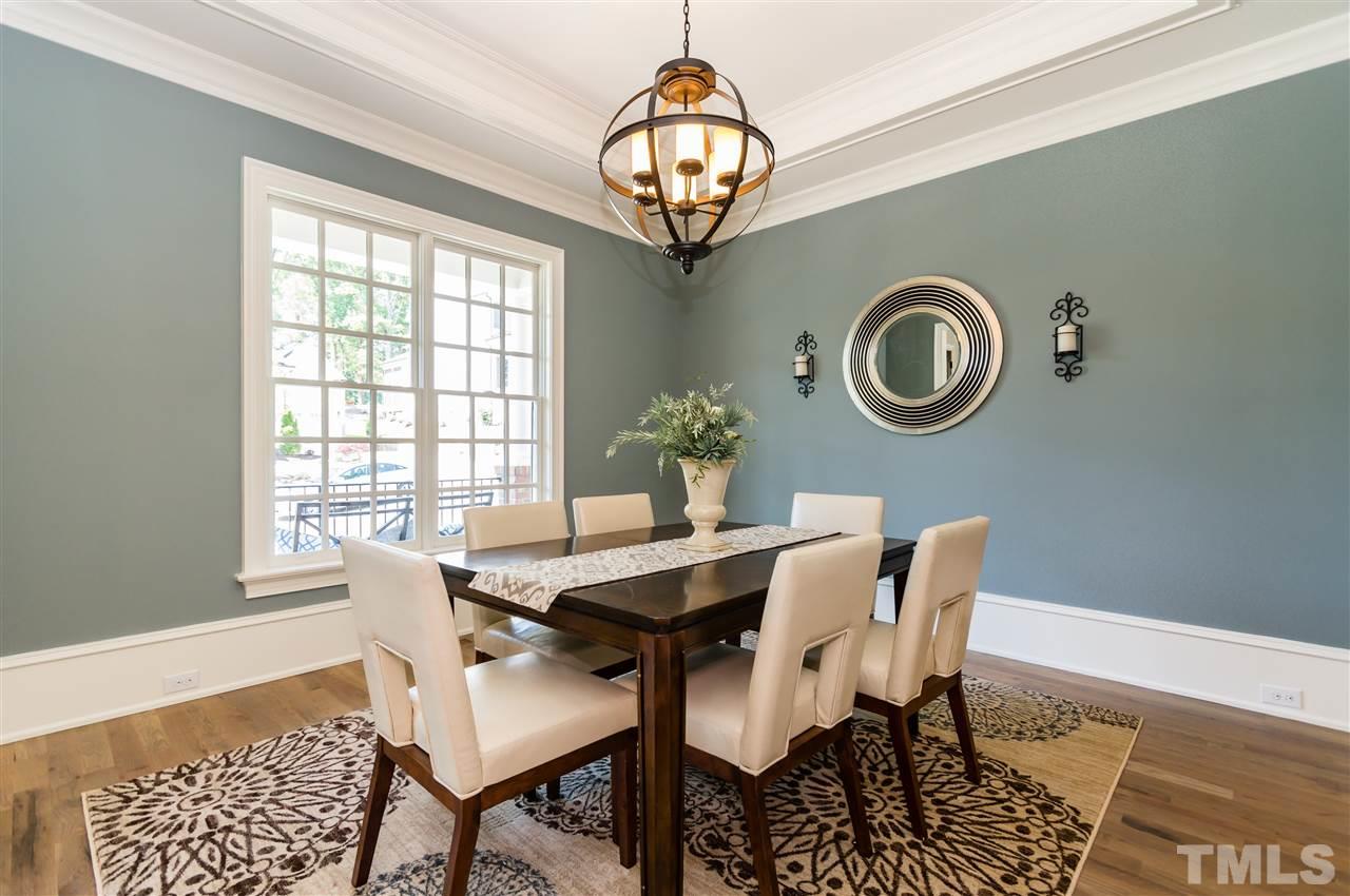 5208 Woodall Way, Unit 11 Raleigh, NC 27613 - Photo 4 of 25 a view of a dining room with furniture and a window