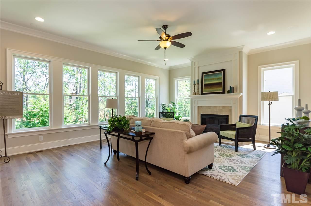 5208 Woodall Way, Unit 11 Raleigh, NC 27613 - Photo 5 of 25 a living room with furniture and a large window