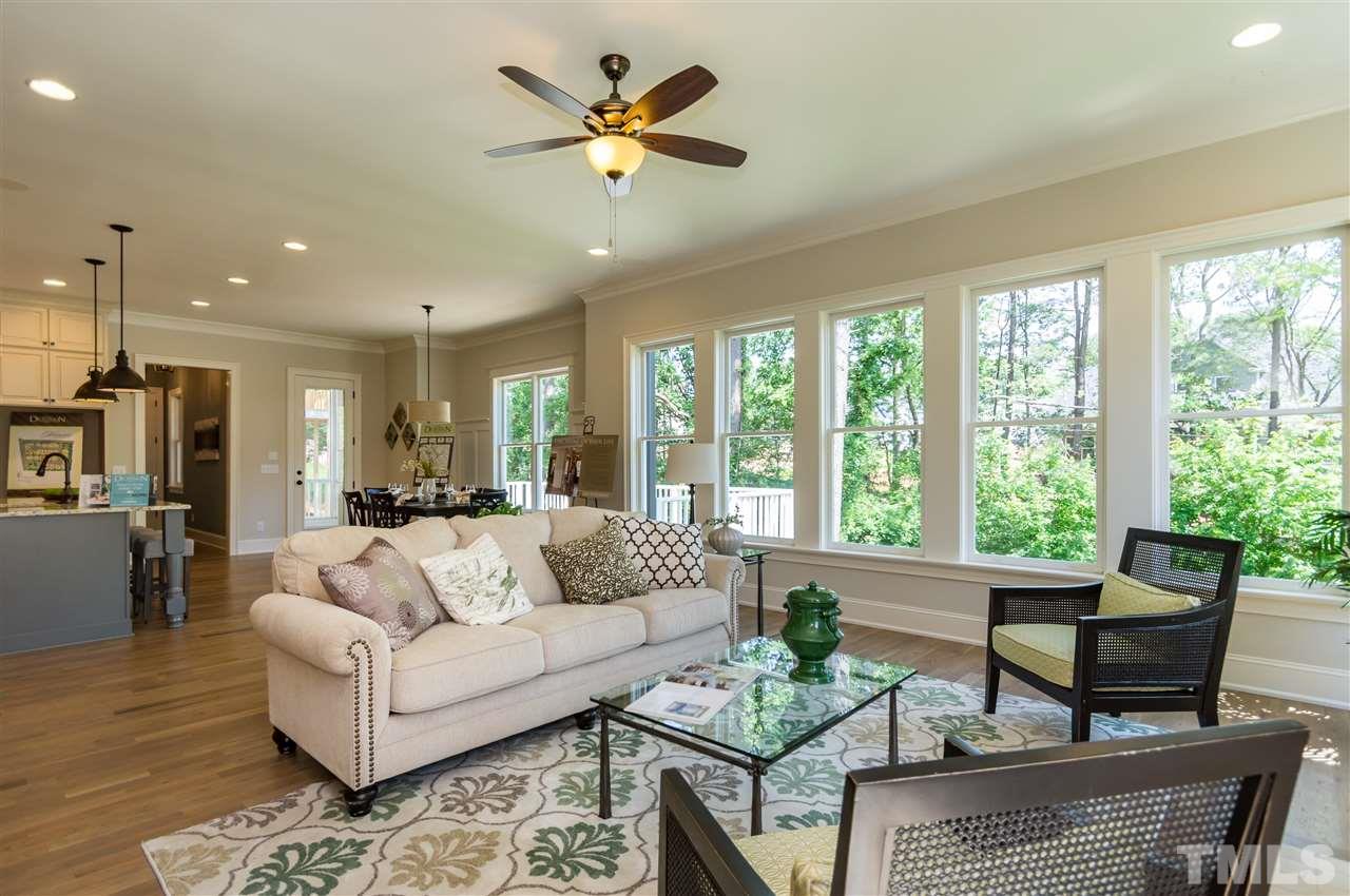 5208 Woodall Way, Unit 11 Raleigh, NC 27613 - Photo 6 of 25 a living room with furniture and a large window