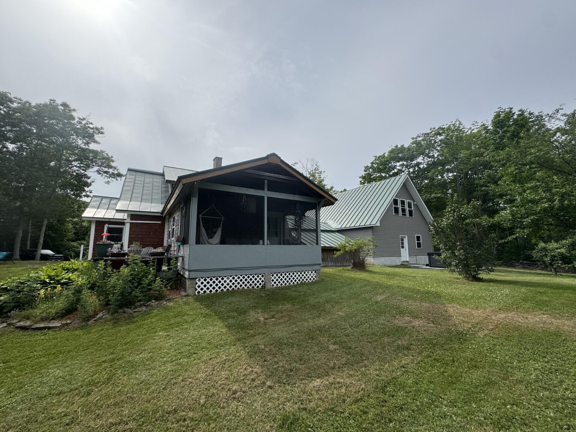71 Garland Road Dixmont, ME 04932 - Photo 6 of 23 Screen porch
