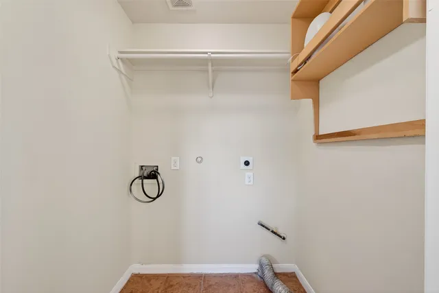 a view of small space with racks on the wall