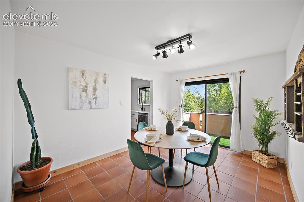 2979 Mesa Road, Unit D Colorado Springs, CO 80904 - Photo 11 of 40 Large dining area with walk-out to the balcony.