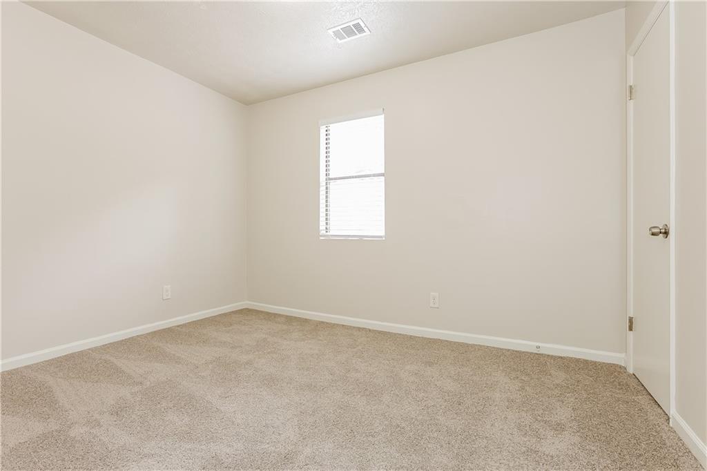 3352 Herrenhut Road Lithonia, GA 30038 - Photo 18 of 27 an empty room with a window