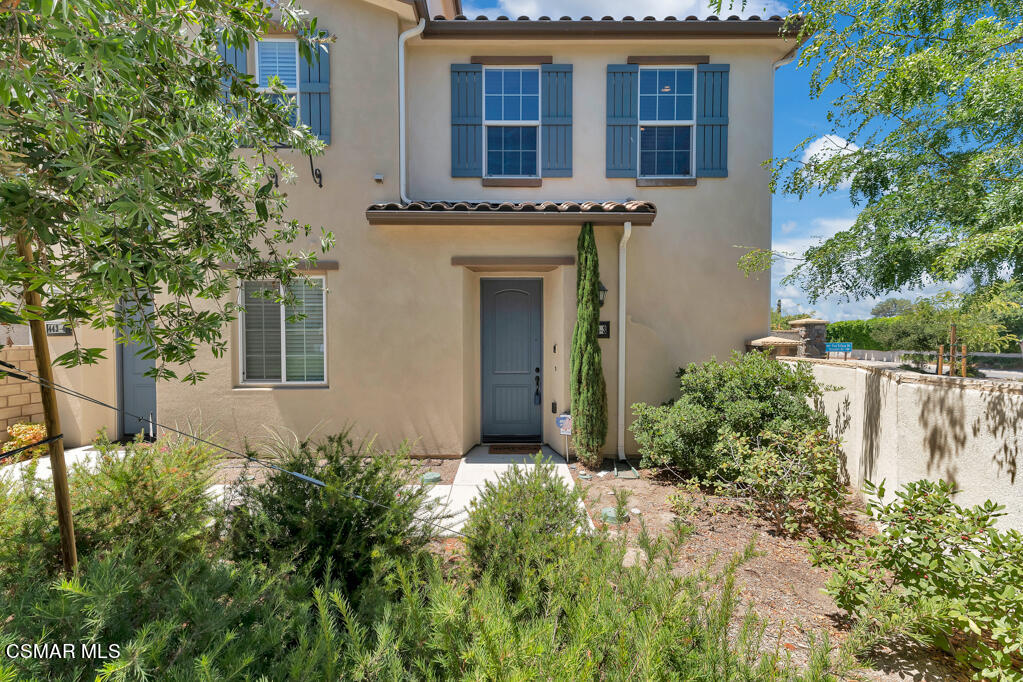 443 Stratus Lane, Unit 3 Simi Valley, CA 93065 - Photo 2 of 41 front view of a house with a yard