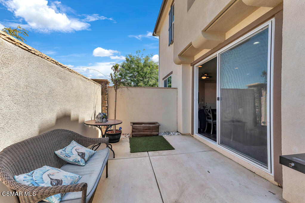 443 Stratus Lane, Unit 3 Simi Valley, CA 93065 - Photo 33 of 41 a backyard of a house with seating space