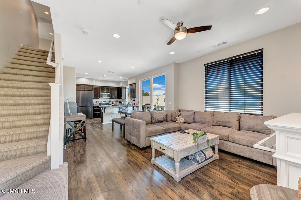 443 Stratus Lane, Unit 3 Simi Valley, CA 93065 - Photo 5 of 41 a living room with furniture ceiling fan and a window