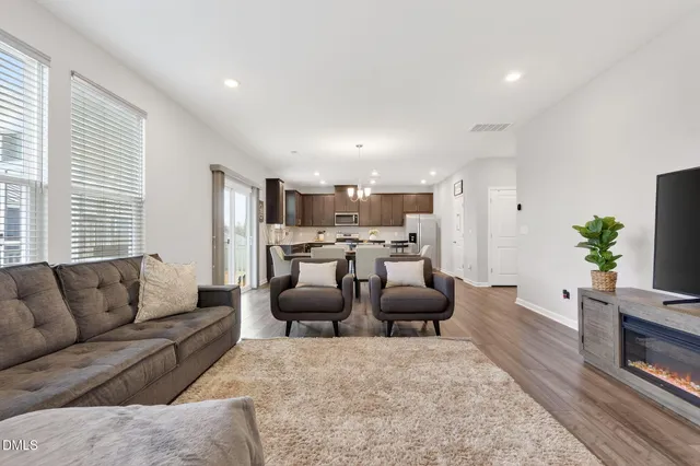 a living room with furniture and a couch