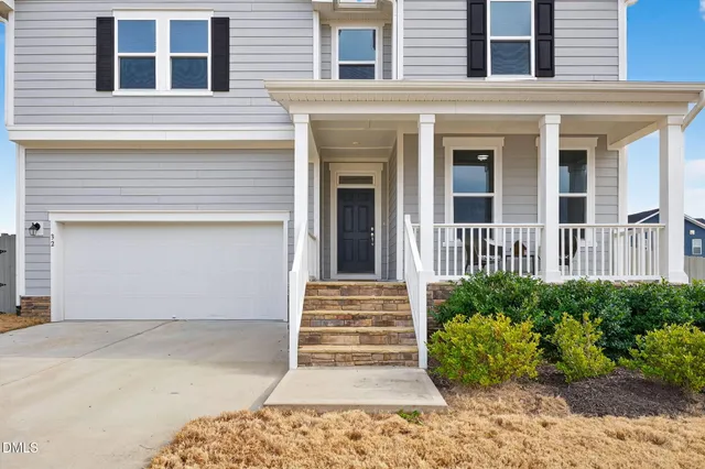a front view of a house having yard