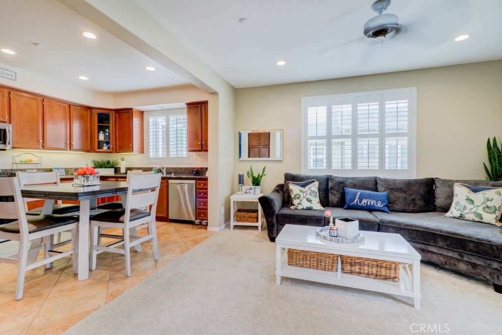 1 Agave Court Ladera Ranch, CA 92694 - Photo 4 of 23 a living room with stainless steel appliances kitchen island granite countertop furniture and a large window