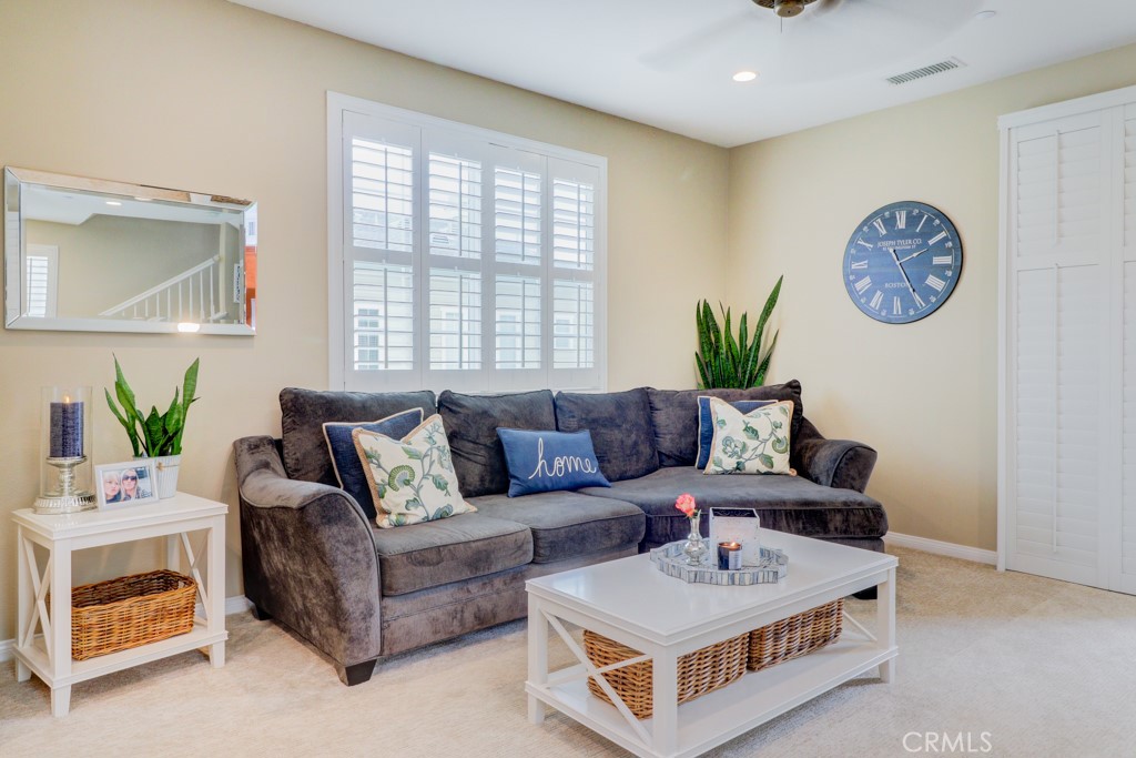 1 Agave Court Ladera Ranch, CA 92694 - Photo 5 of 23 a living room with furniture and a large window