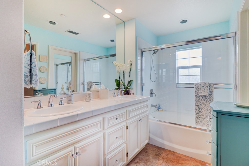 1 Agave Court Ladera Ranch, CA 92694 - Photo 8 of 23 a bathroom with a tub sink and mirror
