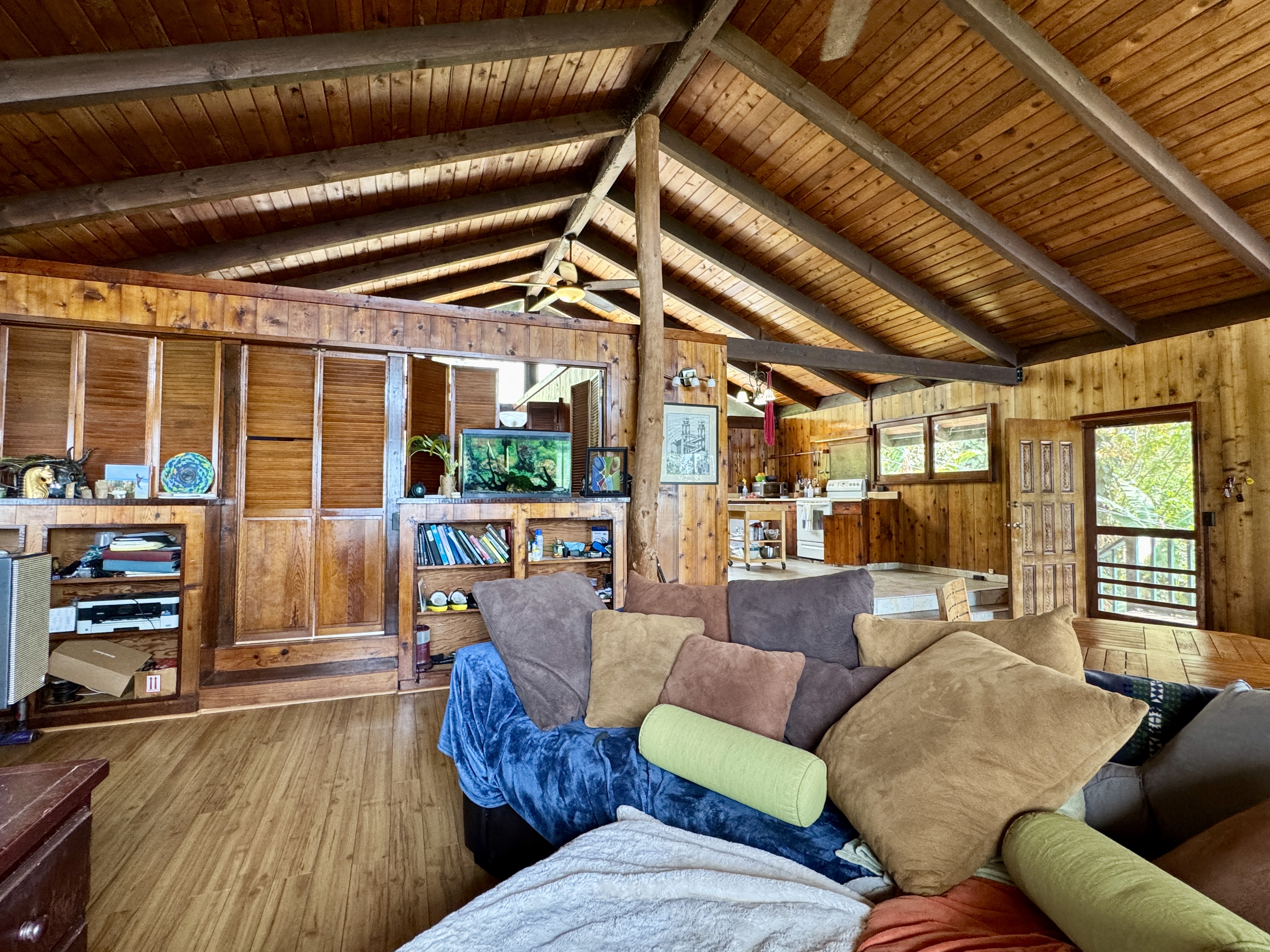 78-1275 Bishop Road Holualoa, HI 96725 - Photo 11 of 16 a living room with furniture and a flat screen tv