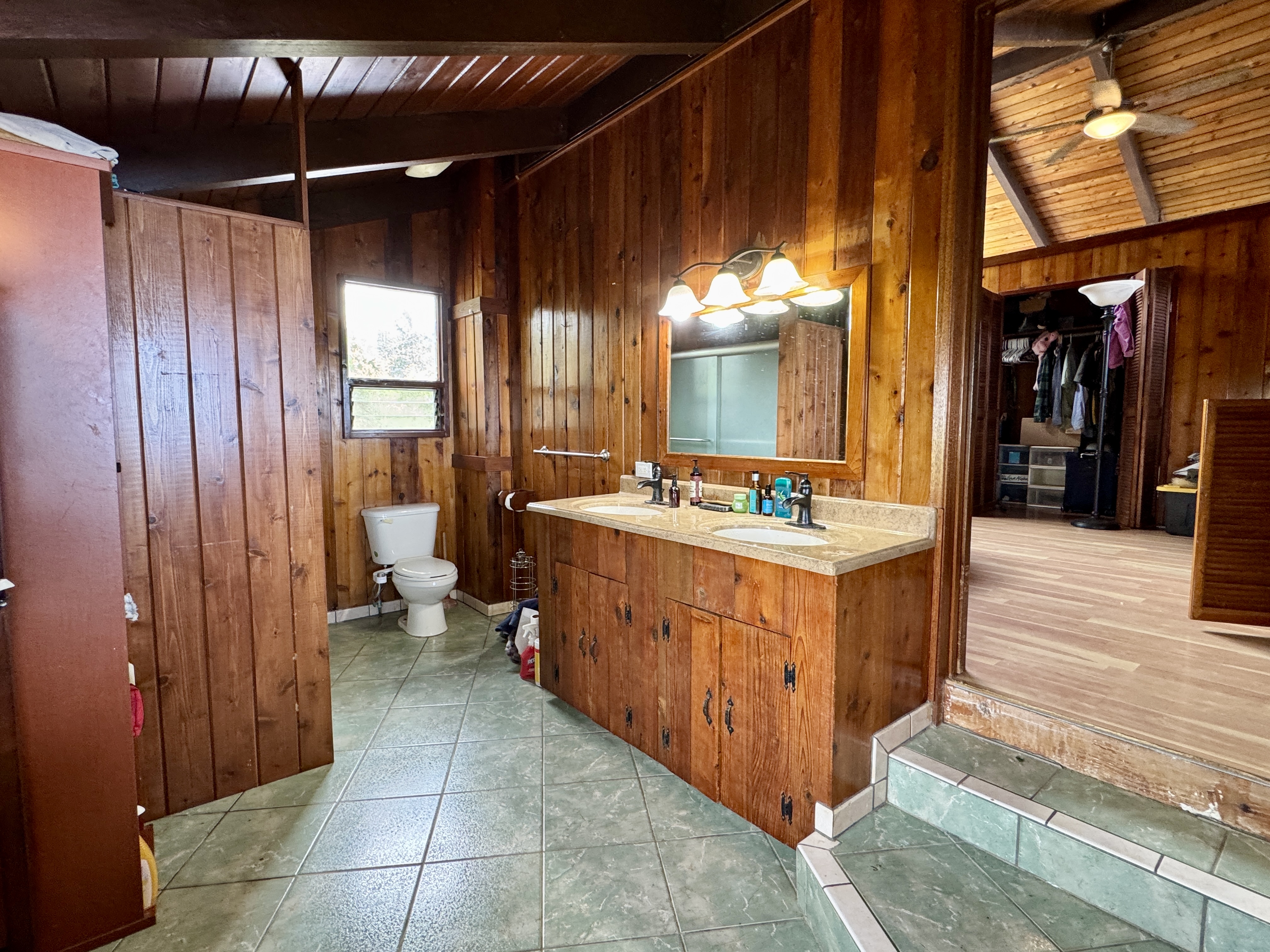 78-1275 Bishop Road Holualoa, HI 96725 - Photo 15 of 16 a bathroom with a sink a mirror and shower