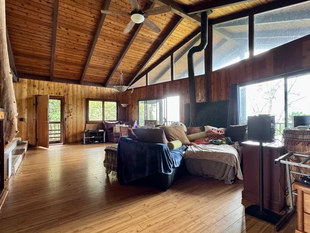 a bed room with bed and a window