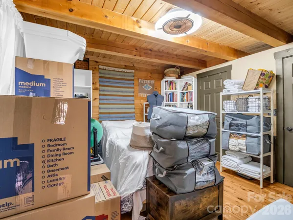 a view of living room with patio furniture