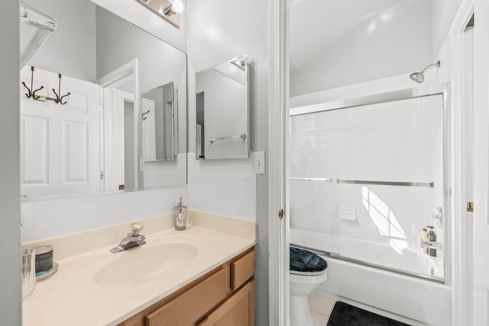 2 Alexander Court Bolingbrook, IL 60490 - Photo 24 of 43 a bathroom with a sink and a mirror