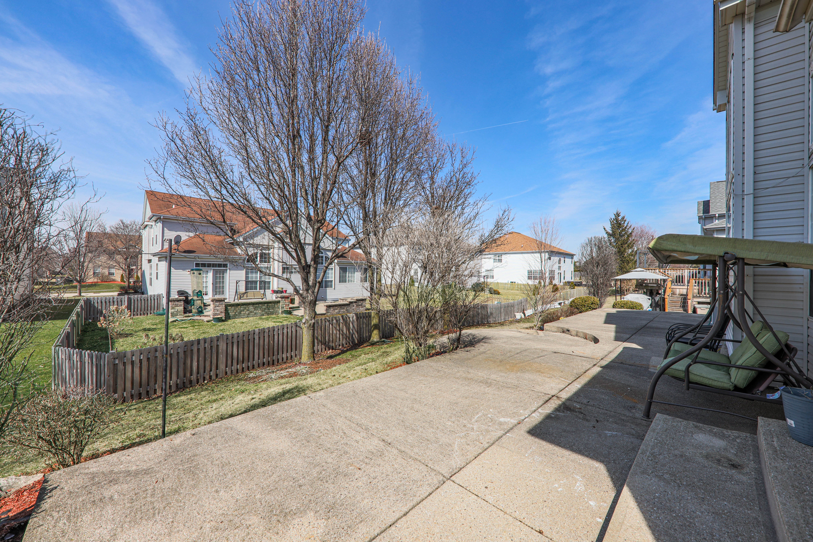 2 Alexander Court Bolingbrook, IL 60490 - Photo 42 of 43 a street view with wooden fence