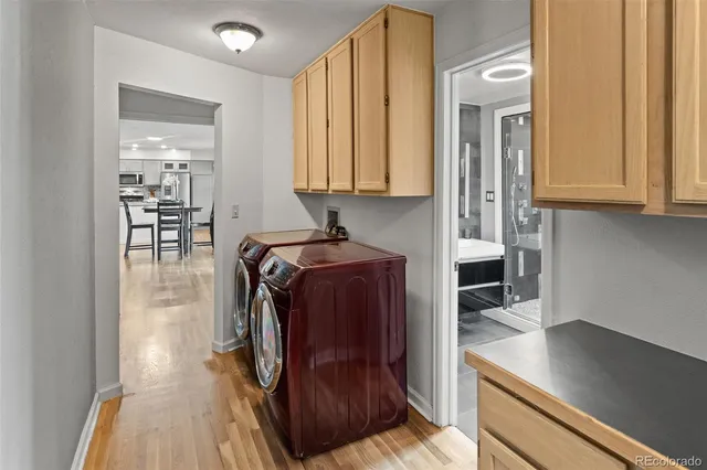 a utility room with dryer and washer