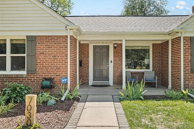 a front view of a house with a porch