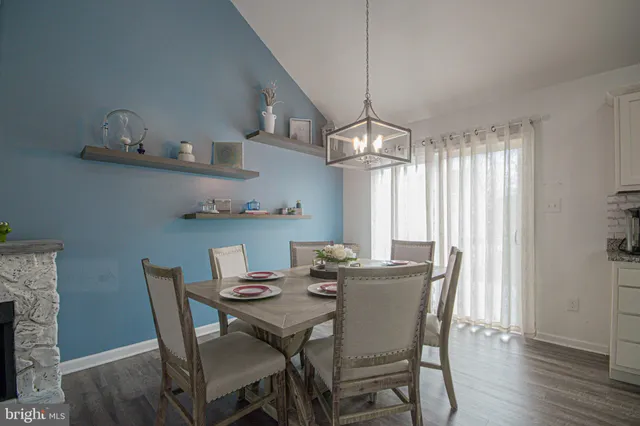 a kitchen with a sink stove and microwave