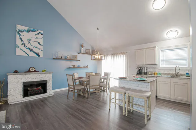 a bedroom with bed and a fireplace