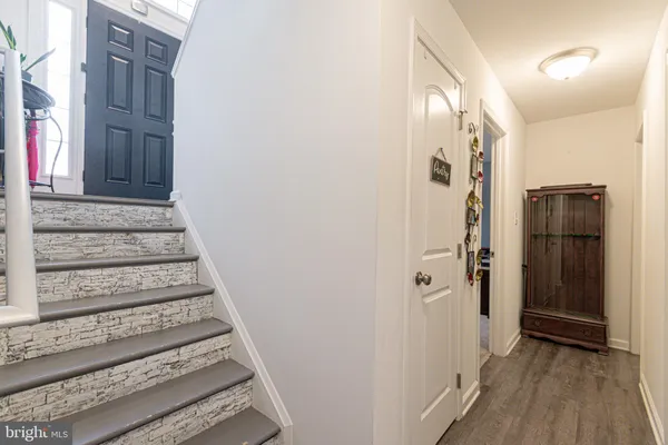a view of a balcony with table and chairs