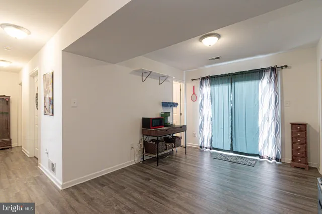 a view of a balcony with furniture