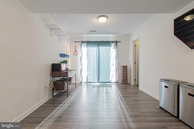 a view of living room and patio yard