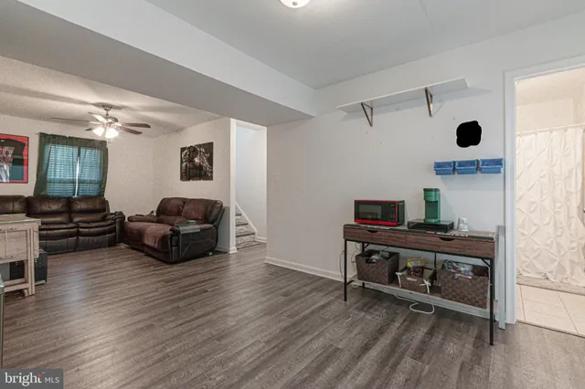 a view of a house with a yard and garage