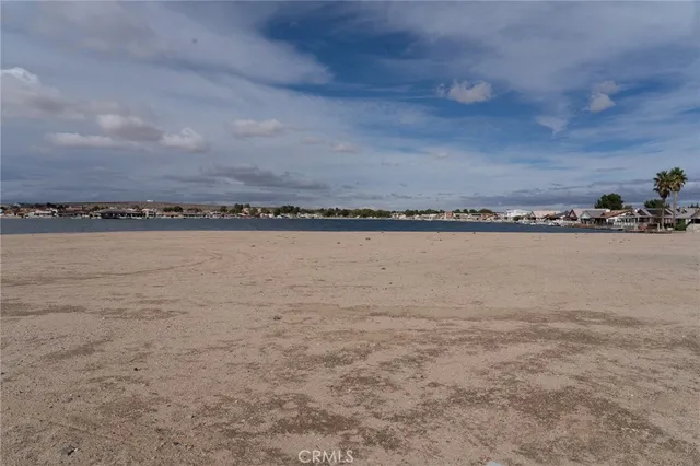 a view of a large body of water and mountain