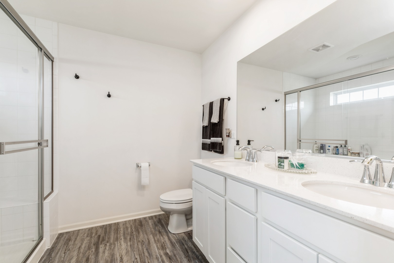 1226 Draper Road McHenry, IL 60050 - Photo 8 of 12 a bathroom with a sink toilet and shower
