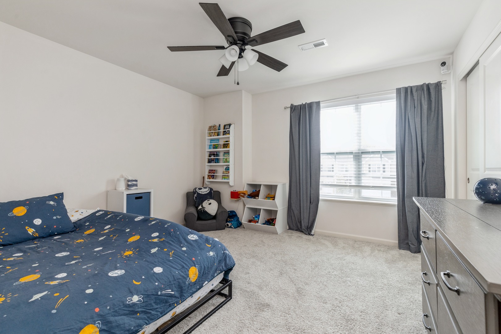 1226 Draper Road McHenry, IL 60050 - Photo 9 of 12 a bed room with a bed and a tv