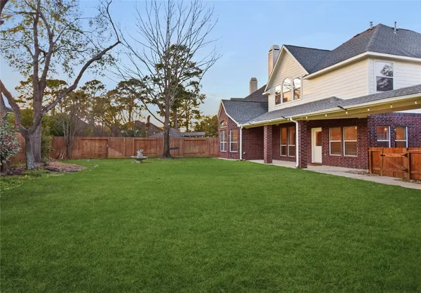 a view of a back yard of the house