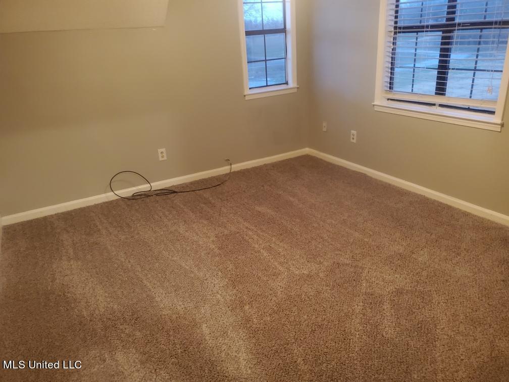1537 Taska Road Red Banks, MS 38661 - Photo 14 of 14 Upstairs Bedroom