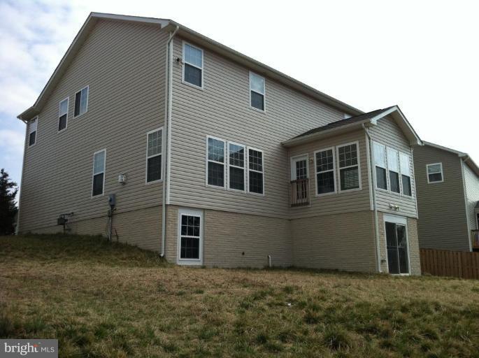 4279 Meyers Road Triangle, VA 22172 - Photo 2 of 24 a house view with a backyard space
