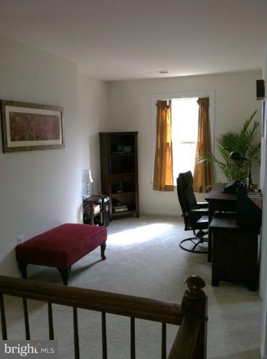 4279 Meyers Road Triangle, VA 22172 - Photo 11 of 24 a view of a workspace with furniture