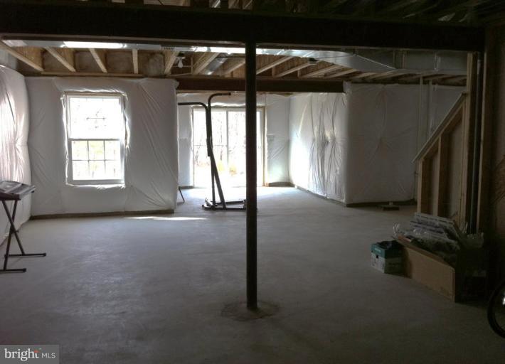 4279 Meyers Road Triangle, VA 22172 - Photo 14 of 24 a view of empty room with windows